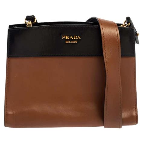 prada brown leather bag with gold metal handle|vintage Prada brown leather bag.